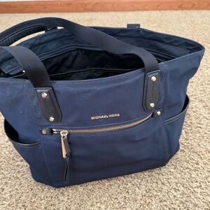 Michael Kors Blue Duffel Bag with Gold Accents